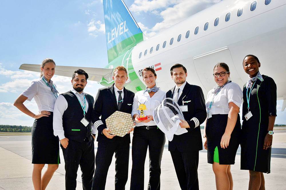 level airlines flight attendants with pilot