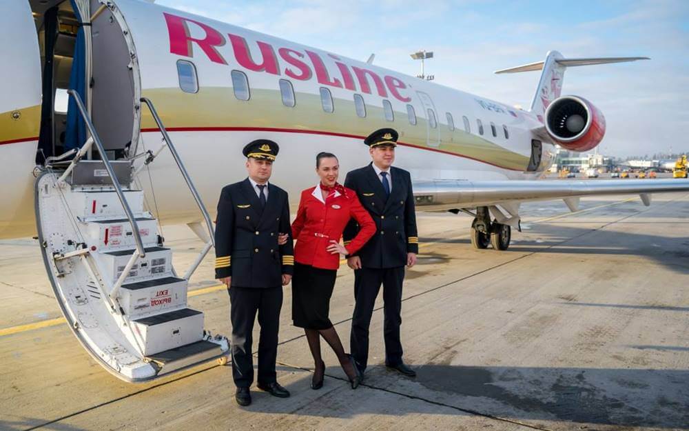 rusline flight attendant with pilots