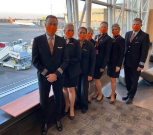 sunwing airlines male and female flight attendants