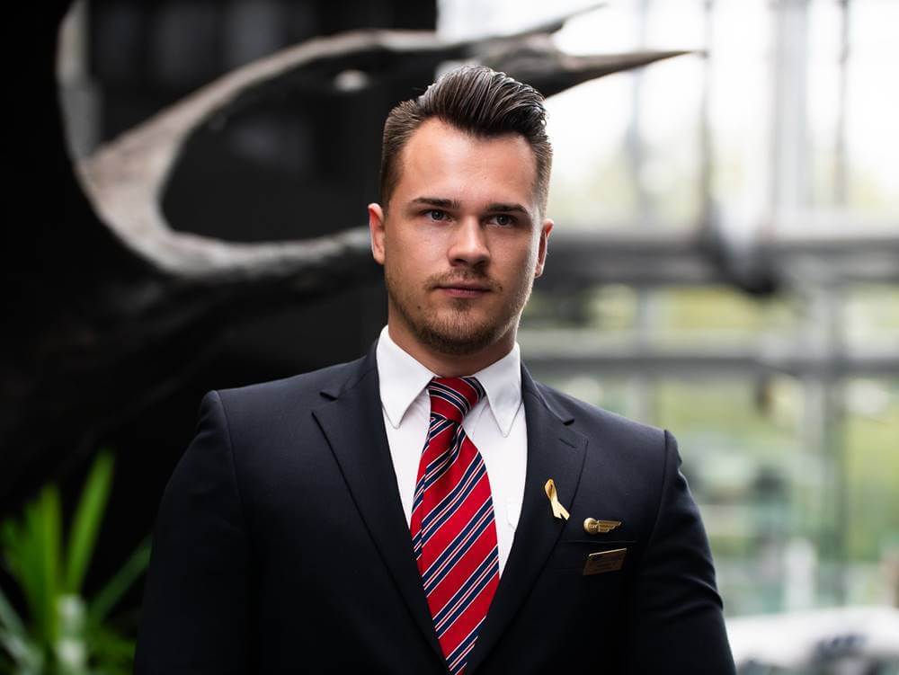 LOT Polish Airlines male flight attendant