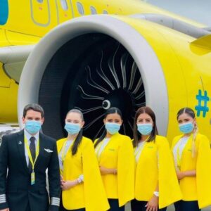 viva air colombia flight attendants with pilot