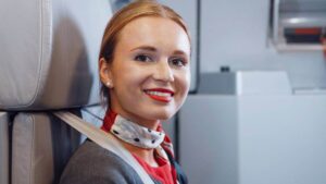 Air Belgium female flight attendant jumpseat