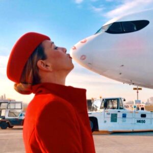 Air Belgium female flight attendant plane kiss