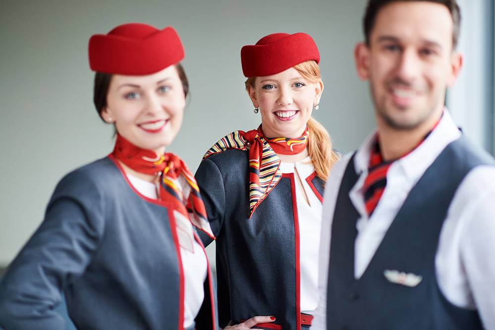 Air Belgium male and female cabin crews smile
