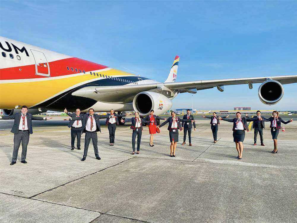 Air Belgium male and female flight attendants tarmac