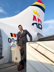 Air Belgium male flight attendant steps