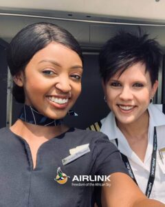 Airlink female cabin crew and female pilot