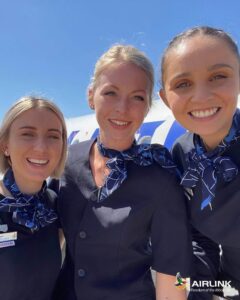 Airlink female flight attendants happy