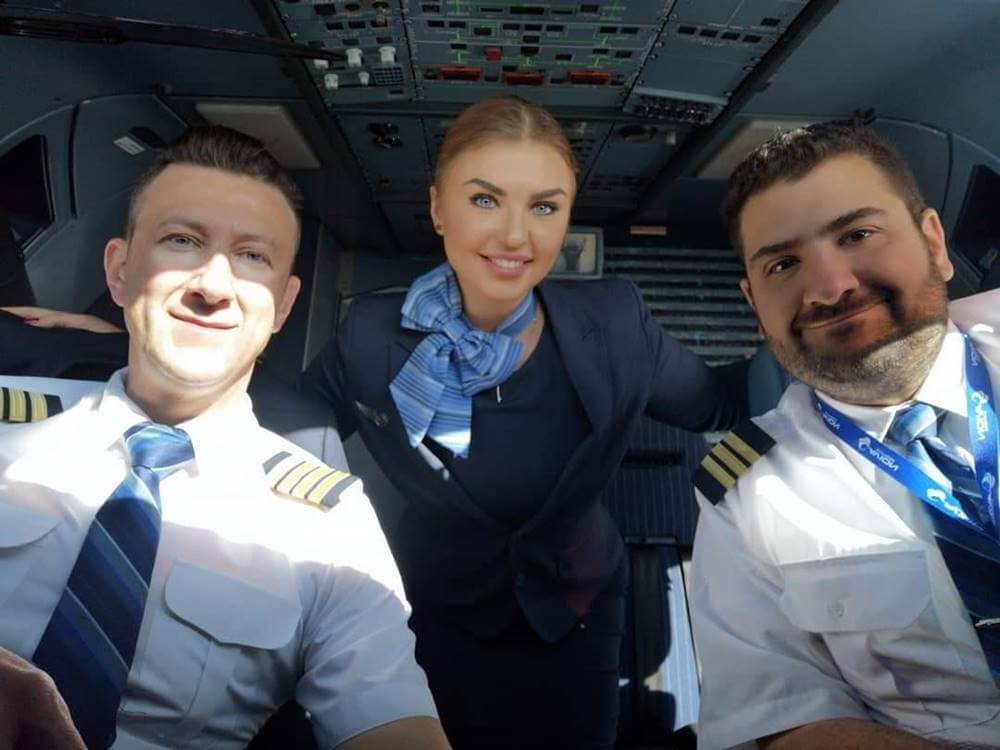 Avion Express pilots and flight attendant cockpit