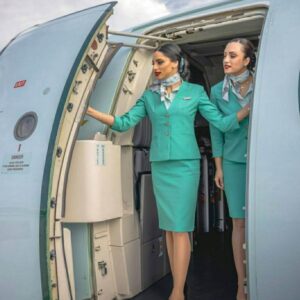Cyprus Airways female flight attendant closing door