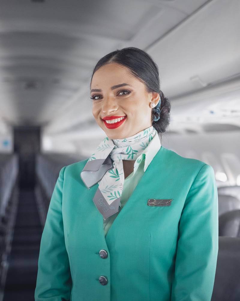 Cyprus Airways female flight attendant smile