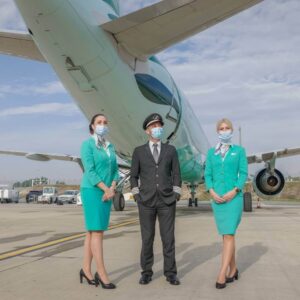 Cyprus Airways female flight attendants and pilot mask