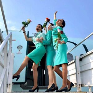 Cyprus Airways female flight attendants flowers