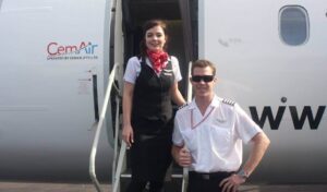 Fly CemAir pilot and female flight attendant