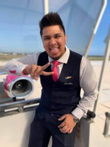 FlySafair male flight attendant smile