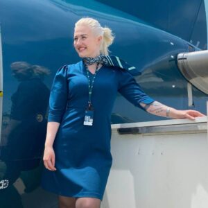 Flyr female flight attendant step