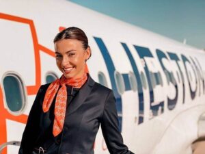 Heston Airlines female cabin crew happy