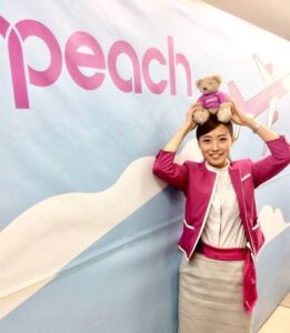 Peach Aviation female flight attendant bear