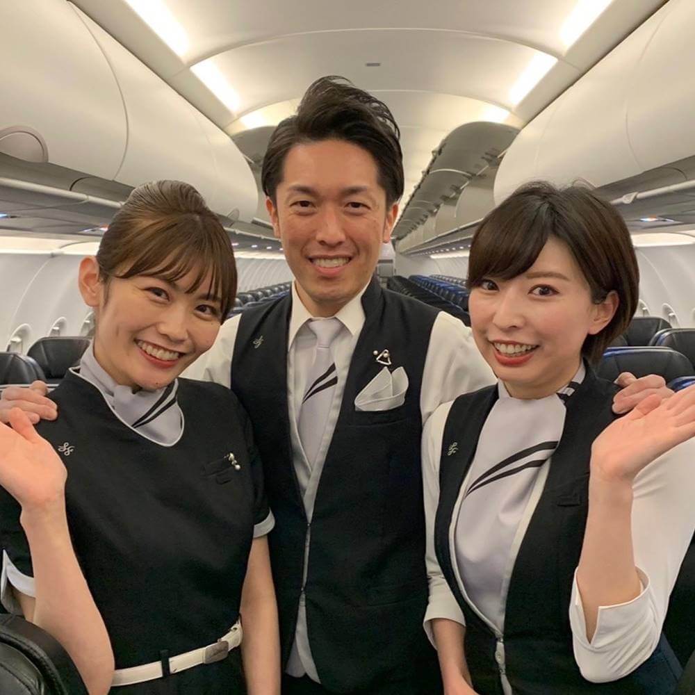 StarFlyer male and female cabin crews happy