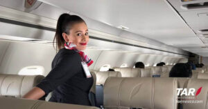 TAR Aerolineas female flight attendant boarding