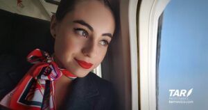 TAR Aerolineas flight attendant window