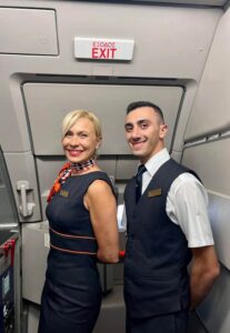 TUS Airways flight attendants door