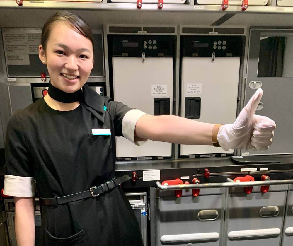 Zipair female flight attendant galley