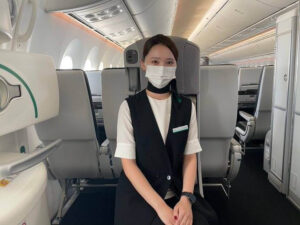 Zipair female flight attendant jumpseat