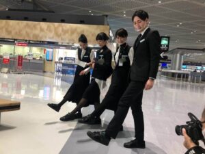 Zipair male and female flight attendants airport