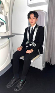 Zipair male flight attendant jumpseat