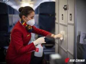 Air China flight attendant cleaning