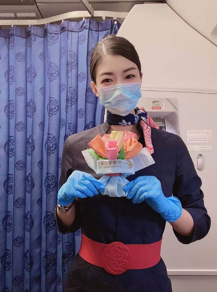 China Eastern Airlines flight attendant flowers