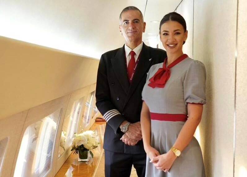 Comlux pilot and female flight attendant