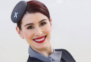 Luxaviation flight attendant smile