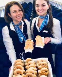 People's Airline female flight attendants bread basket