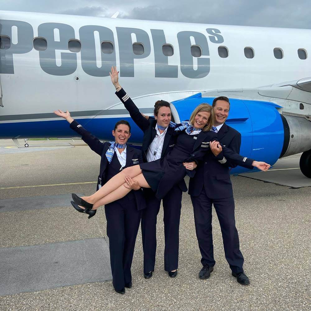 People's Airline flight attendants tarmac playful