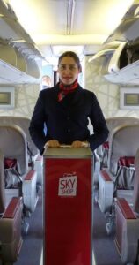 Royal Air Maroc female flight attendant cart