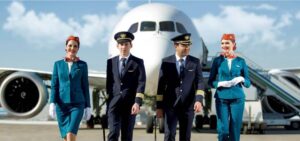 Uzbekistan Airways pilots and cabin crew walk