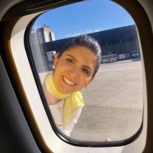 Voepass female flight attendant window