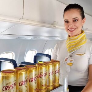 Voepass flight attendant with cart