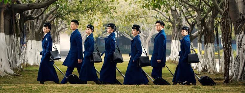 Xiamen Airlines flight attendants walk