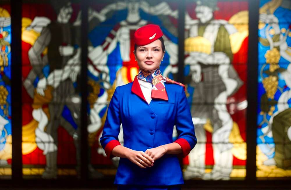 Air Moldova flight attendant colorful