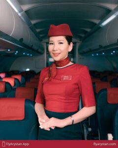 FlyArystan flight attendant smile