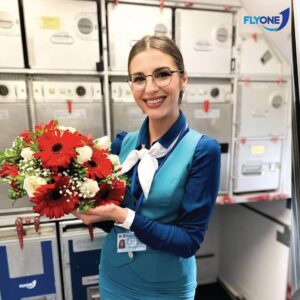 FlyOne flight attendant flowers