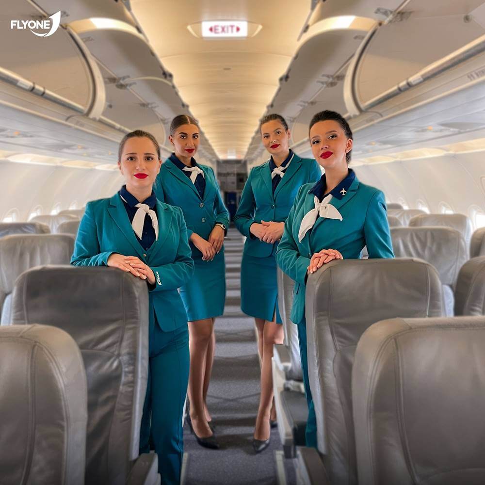 FlyOne flight attendants boarding