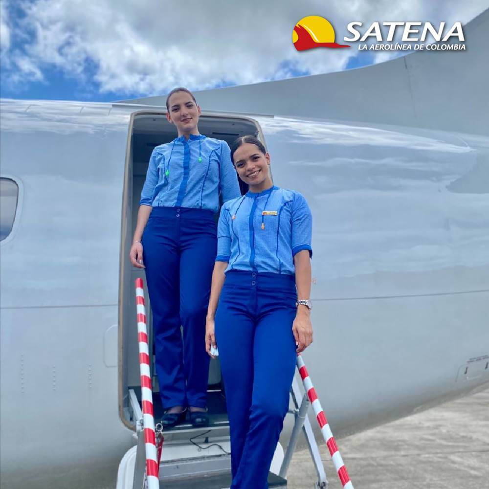 Satena female flight attendants steps