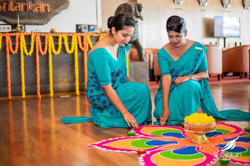 SriLankan Airlines female cabin crews decorate