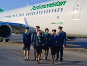 Turkmenistan Airlines flight and cabin crews walk