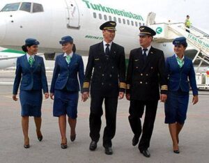 Turkmenistan Airlines flight attendants walk