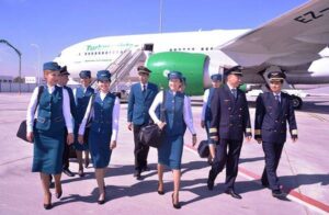 Turkmenistan Airlines pilots and flight attendants walk